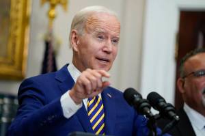 AP Photo / Evan Vucci 
President Joe Biden speaks about student loan debt forgiveness in the Roosevelt Room of the White House, Wednesday, Aug. 24, 2022, in Washington. Education Secretary Miguel Cardona listens at right.