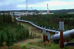 In this undated file photo the Trans-Alaska pipeline and pump station north of Fairbanks, Alaska is shown. (AP Photo / Al Grillo)