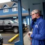 Dave Ringle, executive director of the Society of St. Vincent de Paul in Juneau, removes a face mask after exiting transitional housing Wednesday at the organizations complex on Teal Street, where a public open day will be part of an annual fundraiser Saturday. The complex is in the midst of various upgrades and Ringle said the fundraiser is intended to help both the projects and provide direct aid to residents. (Mark Sabbatini / Juneau Empire)