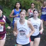 Girls from Southeast Alaska high schools head toward the Treadwell Historic Mine Trail on the 5K course at the Capital City Invite on Saturday morning. (Mark Sabbatini / Juneau Empire)