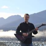 Juneau musician Michael Maas poses for a photo to promote his newest album Here Be Dragons, coming out on Friday, Oct. 7. This latest endeavor is being released under Maas Blue Nagoon project and was a collaboration of several different lead vocalists, many of which are local Juneau artists. (Jonson Kuhn / Juneau Empire)