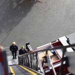 Jonson Kuhn / Juneau Empire 
Capital City Fire/Rescue engineer Peter Flynn and firefighter Connor Hoyt stand at the bottom of the departments new truck ladder on Thursday, Oct. 6 during training operations at the Glacier Fire Station.