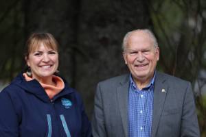 Heidi Drygas, who is running for lieutenant governor, and Bill Walker, who is running for governor, smile outside the Juneau Empires offices after an interview this week. Walker said hes hopeful voters will understand his decision to draw from the Alaska Permanent Fund to fund state government. (Ben Hohenstatt / Juneau Empire)