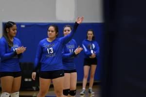 Senior Talita Toutailepo waves to the crowd during introductions before the teams first match up against the Ketchikan Lady Kings back in early Sept. Over the weekend Toutailepo came up big in THMS second face off against the Lady Kings. (Ben Hohenstatt / Juneau Empire File)