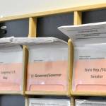 Forms to run for state office are displayed at the Alaska Division of Elections’ offices in Juneau in June. Candidates and organizations in statewide contests were required to file campaign finance reports on Monday, detailing their spending, expenses and cash on hand one month before the Nov 8 election. (Peter Segall / Juneau Empire file photo)