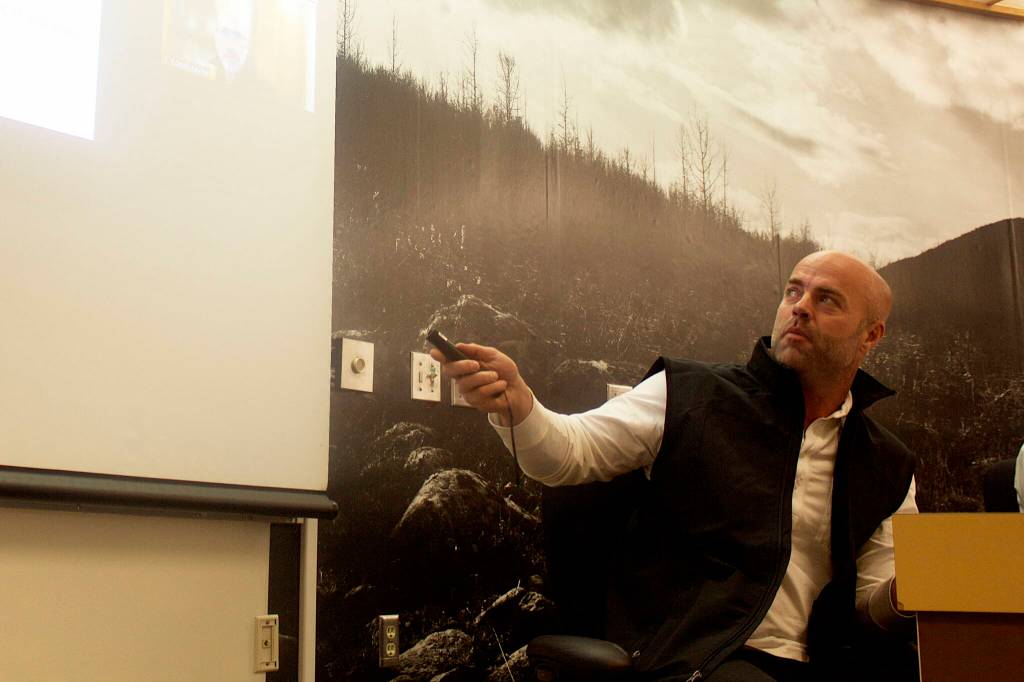 Mark Sabbatini / Juneau Empire 
Garrett Johnson, a partner in Rooftop Properties, explains his companys plans to built up to 444 residences in what it calling the Ridgeview Subdivision during Tuesday nights Planning Commission meeting.