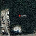 An overhead view of a 20-acre site for a proposed housing project that would build up to 444 apartments and townhomes on a hillside along Glacier Highway shows a neighboring residential area that is less dense. Many people living in the neighborhood are objecting to the proposed project due to concerns about increased traffic and other intrusions. (Google Maps)