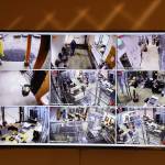 A TV hanging in the lobby of the CBJ Ballot Processing Center shows members of the Canvass Review Board from several different angles Monday morning. The election is expected to be certified by the board on Wednesday, according to city clerk Beth McEwen. (Clarise Larson / Juneau Empire)