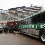 An Alaska Coach Tours bus sits parked beside the cruise ship dock in downtown Juneau. Alexandra Pierce, the CBJ tourism manager, said this years season went relatively smoothly and said the revival of tourism was overall well received by the residents and downtown businesses. (Clarise Larson / Juneau Empire)