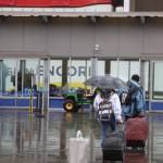 Clarise Larson / Juneau Empire
People roll their suit cases toward the entrance to the Norwegian Encore on Tuesday afternoon. In total this seasons average capacity level across cruise lines hit around 74% over its multiple-month span, according to Cruise Lines International Association Alaska, which equates to around a quarter below the average capacity level pre-pandemic when ships were almost always full.