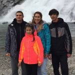 Andrii Pomynalnyi, left, his wife Olena, son Yehor and daughter Irynka visit Nugget Falls on Sept. 28, the same day the Ukrainian family arrived in Juneau after a journey that began Feb. 24 with Russian attacks near their home in Kyiv. The father said he is hoping the family can remain in Juneau for at least two years and possible beyond due to the destruction and future uncertainty in his homeland. (Courtesy of Kate Troll)