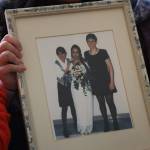 Clarise Larson/ Juneau Empire
Harmony Wentz, Faith Rogers daughter, holds a framed picture showing a young Faith and her two sisters. According to Juneau Police Department spokesperson Lt. Krag Campbell, authorities are working to identify a suspect in Rogers death.