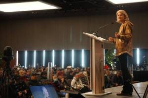 Sen. Lisa Murkowski delivers a speech on Friday during the second day of the Alaska Federation of Natives 2022 convention. Murkowski, a Republican running for reelection, got a standing ovation and several rounds of applause during her speech. (Photo by Yereth Rosen / Alaska Beacon)