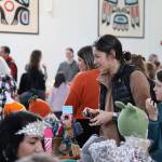 Residents made their way through the more than 30 local vendor booths included at the Juneau Arts & Culture Center for the first-ever Pumpkin Spice Market, a fall-themed festival hosted by the Juneau Arts and Humanities Council which celebrated local artists, businesses and organizations here in the capital city. (Clarise Larson / Juneau Empire)