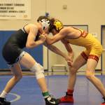 Thunder Mountain High School wrestler Carson Cummins goes head to head with his competition Saturday afternoon during the Brandon Pilot Invitational Wrestling Tournament at THMS. At 119 lbs. senior, Cummins took first going 7-0 for the weekend. (Clarise Larson / Juneau Empire)