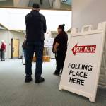 A handful of voters stood in a line at Juneaus Region I Elections Office Monday morning to cast their ballots to decide who will fill the offices for Alaskas governor and lieutenant governor, U.S. senator and representative and Alaska State senators and representatives. (Clarise Larson / Juneau Empire)