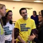 Staff from The Glory Hall including (from left to right) Program Manager Teal Goodfell, Interim Executive Director Chloe Papier and Deputy Director Luke Broman discuss homeless and housing issues with U.S. Rep. Mary Peltola during a campaign event Monday at Elizabeth Peratrovich Hall. (Mark Sabbatini / Juneau Empire)