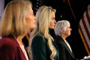 Republican Kelly Tshibaka, center, a Republican, looks on Thursday, prior to a U.S. Senate debate in Anchorage. She faces U.S. Sen. Lisa Murkowski, left, and Democrat Pat Chesbro, right, in the Nov. 8 general election. (AP Photo/Mark Thiessen)