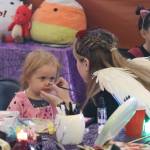 Face painting was just one of many attractions offered at JDHSs Spirit of Fall Carnival. Attendees also enjoyed a host of games, crafts, refreshments and indoor trick-or-treating. (Jonson Kuhn / Juneau Empire)