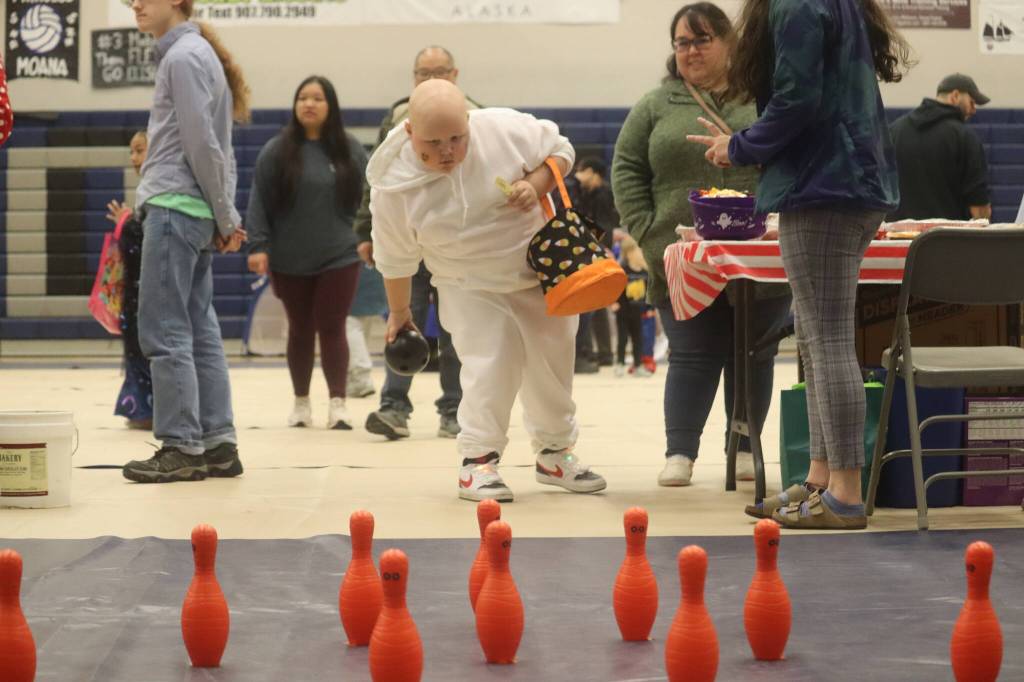 There were no shortage of games for kids in costumes at TMHS first Fall Carnival. In addition to games, the carnival also offered several booths throughout, as well as a giant bounce castle. (Jonson Kuhn / Juneau Empire)