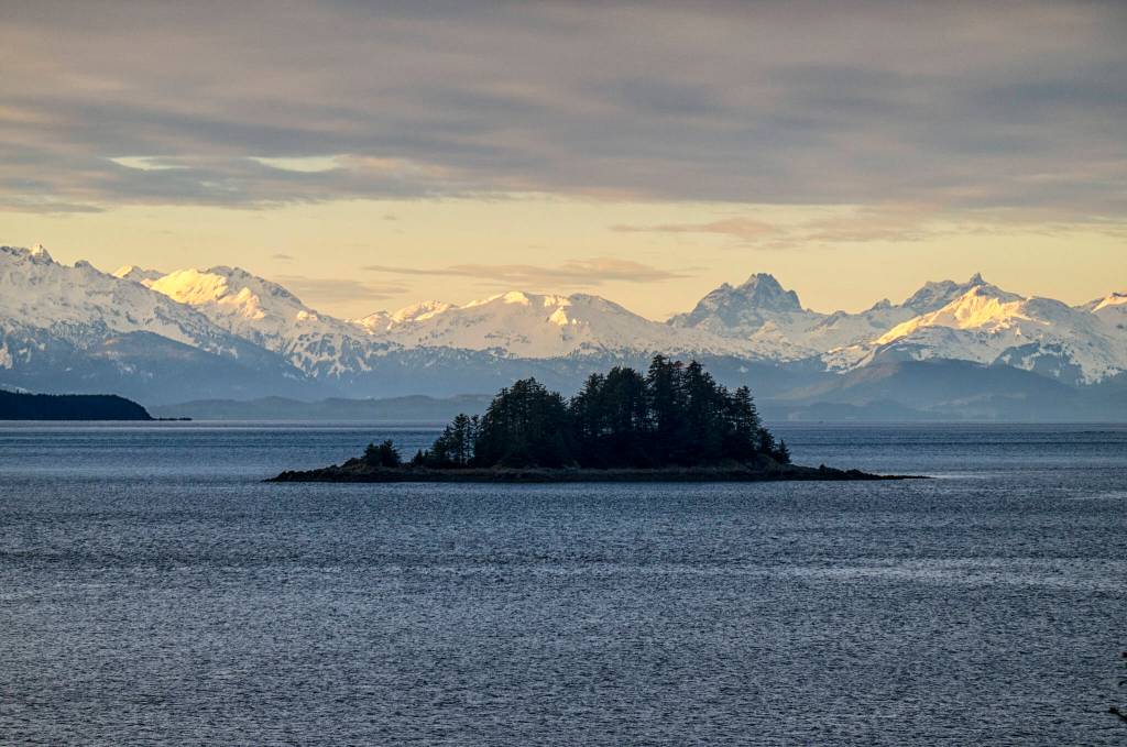 This photo shows Cohen Island with the Lynn Canal and the Chilkat Range, Southeast Alaska.(Courtesy Photo / Kenneth Gill, gillfoto)