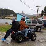 Two Chatham School District students ride their four-wheeler home from the schools gym in late October. According to data from Feeding America, a nationwide nonprofit that works to address food insecurity, its estimated that 22.8% of the child population in the Hoonah-Angoon Census Area experienced food insecurity in 2019, which is 56.2% higher than the national average.(Clarise Larson / Juneau Empire)