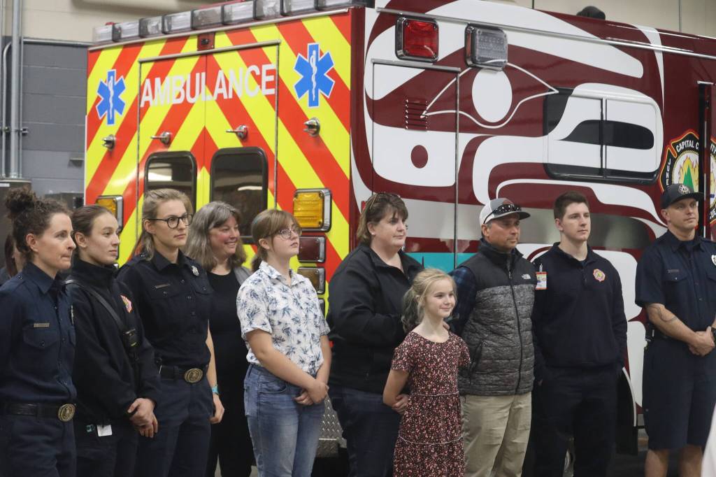 Friends, family and colleagues of Acting Captain John Adams gathered at the Downtown Juneau Station 1 on Tuesday, Nov. 1 to support Adams as he was presented with the 2022 Fire Life Safety Educator of the Year. (Jonson Kuhn / Juneau Empire)