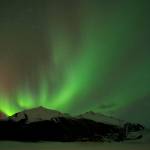 The Aurora Borealis glows over the Mendenhall Glacier in 2014. (Michael Penn / Juneau Empire File)