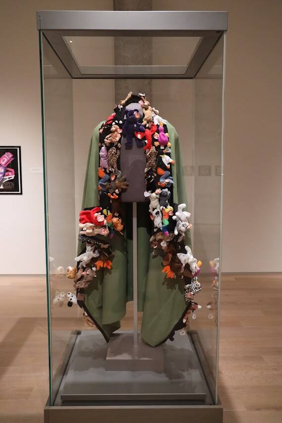 Dozens of Ty Beanie Babies line a fur robe displayed in the center of Alison Bremner Nax̲shag̲eit exhibit Midnight at the Fireworks Stand, which opened Friday at the Alaska State Museum in downtown Juneau. (Clarise Larson / Juneau Empire)