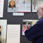 Mark Sabbatini / Juneau Empire 
Don Gotschall, a Juneau resident who served in the military during the Korean War, looks at a display featuring the stories of Vietnamese residents who lost limbs and suffered other injuries as a result of small bombs left by the U.S. during the Vietnam War. The display is part of the exhibit Waging Peace In Vietnam: The Story of U.S. Soldiers and Veterans Who Opposed the War, and organizers say there are still hundreds of thousands of such bombs scattered throughout Vietnam today.