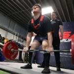 A competitor in the first-ever USA Powerlifting Coastal Clash competition hosted in Juneau starts his first round of deadlifting Saturday afternoon. (Clarise Larson / Juneau Empire)