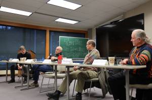David Noon, Ron Carver, Mike Wong and John Kent sit together for a roundtable discussion at the University of Southeast Alaska Saturday afternoon to talk about their personal experiences with the war in Vietnam and the traumas and lasting impacts it had on their lives. (Clarise Larson / Juneau Empire)