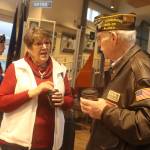 Donna Hurley and Tim Armstrong discuss the sinking of the USS Juneau during a reception Sunday at the Mount Roberts Tram terminal following a memorial ceremony commemorating the 80th anniversary of the vessels sinking. Both longtime Juneau residents are among those whove met some or all of the 10 survivors of the 697 soldiers aboard the ship. Hurley, who met survivors during a trip to the ships construction site in New Jersey, also made a string of remembrance beads with one pearl for each solider who was killed, plus other beads for noteworthy people associated with the ship. Armstrong introduced surviving members who served as grand marshals of the local Fourth of July parade in 1987. (Mark Sabbatini / Juneau Empire)
