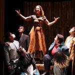 The cast of Theatre in the Roughs production of Witch finishes off an unexpected musical number with flourish. From left to right: Stacy Katasse, Ty Yamoaka, Aaron Elmore, Katie Jensen, Cate Ross, Kelsey Riker, Salissa Thole, Dakota Morgan and Patrick Minik. The local companys production of the play includes a few musical moments unique to the Juneau effort. (Ben Hohenstatt / Juneau Empire)