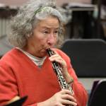 Local musician Jetta Whittaker warms up her instrument during the Con Brio Chamber Series Tuesday evening rehearsal. (Clarise Larson / Juneau Empire)