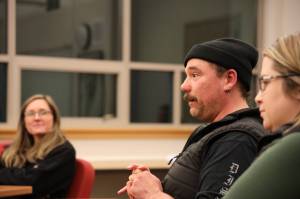 Juneau Education Association president Chris Heidemann talks during the Juneau Board of Education and JEAs annual meet and greet Tuesday night. (Clarise Larson / Juneau Empire)