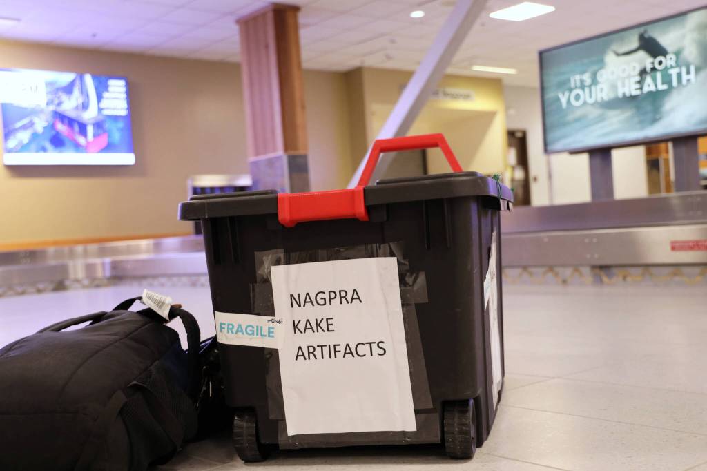 Clarise Larson / Juneau Empire 
A black tote holding Alaska Native artifacts sits on the ground of the Juneau International Airport Thursday afternoon. It was flown from Seattle after being filled with 25 Alaska Native artifacts held at George Fox University in Oregon.