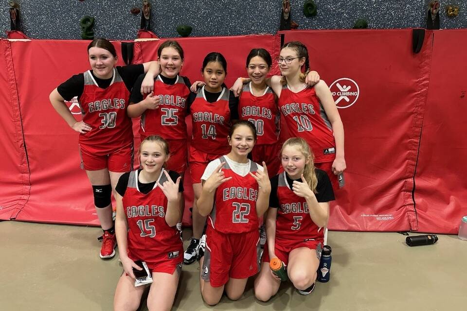 From left to right, Floyd Dryden A team members Cassie Chenoweth, Aurora Lee, Kyndal Secada, Ari Maake, Addy Hartman, Alyssa Travis, Riley Moorehouse and Riley Schultz smile for a photo. (Courtesy / Jessica Nelson)