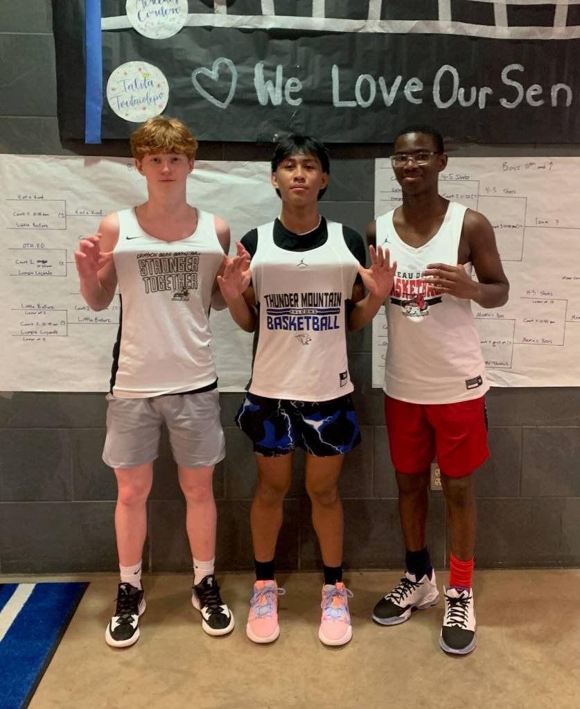 This photo shows 3v3 Pre-Season Tournament division-winning team 3 of a Kind , featuring Gavin Gerrin, Joren Gasga and Ahmir Parker. (Courtesy Photo)
