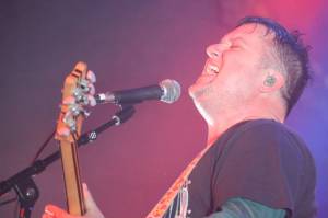 Modest Mouse frontman Isaac Brock screams to a sold out crowd for the opening show of a three-night stay at Seattles Showbox venue Monday, Nov. 21. Modest Mouse is currently touring to commemorate the 25th anniversary of the bands fourth album The Lonesome Crowded West. (Jonson Kuhn / Juneau Empire)