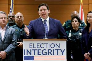 Florida Gov. Ron DeSantis speaks during a news conference at the Broward County Courthouse in Fort Lauderdale, Fla., Aug. 18, 2022. Florida, Georgia, Texas and Virginia all started new law enforcement units to investigate voter fraud in this years elections based on former President Donald Trumps lies about the 2020 presidential contest. So far, those units seem to have produced more headlines than actual cases. (Amy Beth Bennett / South Florida Sun-Sentinel)