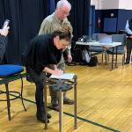 Former Alaska Gov. Sarah Palin is the first to sign a petition Nov. 17 in Anchorage for a ballot initiative to repeal ranked choice voting. Palin, a Republican who lost the U.S. House race to Democrat Mary Peltola in this months election, is among those arguing a Republican would have been elected to the seat with a closed party primary  instead of an open primary where the top four candidates advance  and without ranked choice voting. (Sara For Alaska / Twitter)