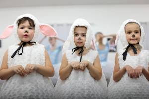 Lambs Sienna Mueca, Minuet Cryderman, Ari Bay rehearse for "The Nutcracker" ahead of Juneau Dance Theatre's annual production of the ballet. 
(Ben Hohenstatt / Juneau Empire)