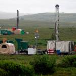 In this July 13, 2007, photo, workers with the Pebble Mine project test drill in the Bristol Bay region of Alaska, near the village of Iliamma. (AP Photo / Al Grillo)