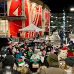 The children of Juneau Alaska Music Matters sing Rudolph the Red-Nosed Reindeer and other classic holiday songs in downtown Juneau during this years Gallery Walk. (Jonson Kuhn / Juneau Empire)