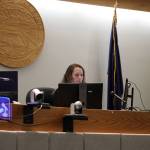 Judge Marianna Carpeneti presides Tuesday in the arraignment hearing for Anthony Michael Migliaccio who was arrested in November on charges in the killing of Faith Rogers. Migliaccio called in for the hearing via phone call from Lemon Creek Correctional Center. (Clarise Larson / Juneau Empire)