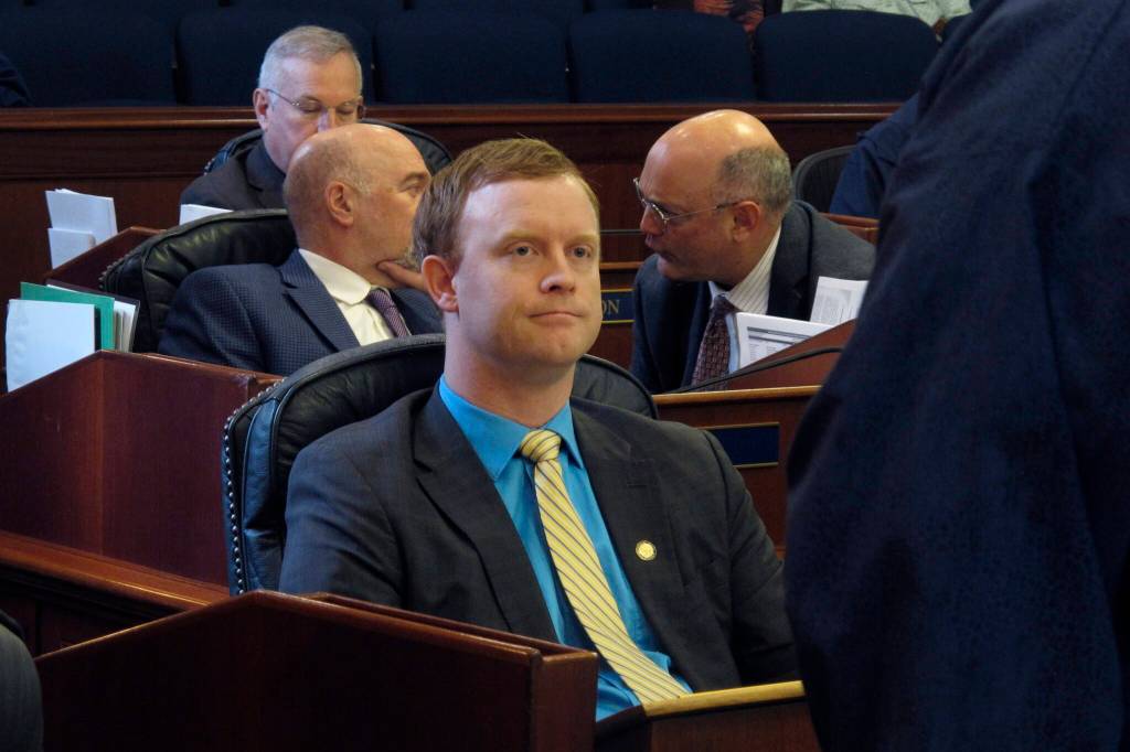 Alaska State Rep. David Eastman, a Wasilla Republican, is shown seated on the House floor on April 29 in Juneau. His district seat is among those whose fate is unknown, due to a pending lawsuit challenging his eligibility because of his membership in Proud Boys. (AP Photo/Becky Bohrer, File)