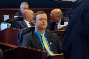 Alaska State Rep. David Eastman, a Wasilla Republican, is shown seated on the House floor on April 29 in Juneau. His district seat is among those whose fate is unknown, due to a pending lawsuit challenging his eligibility because of his membership in Proud Boys. (AP Photo/Becky Bohrer, File)