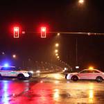 Police vehicles block Egan Drive going toward the Mendenhall Valley after a multi-vehicle wreck Wednesday evening. (Clarise Larson / Juneau Empire)