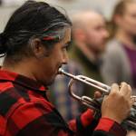 Luis Cardenas Casillas, a member of the Sitka Fine Arts Camp Holiday Brass, rehearses with the Juneau Symphony for the upcoming Holiday Cheer concert. (Ben Hohenstatt / Juneau Empire)